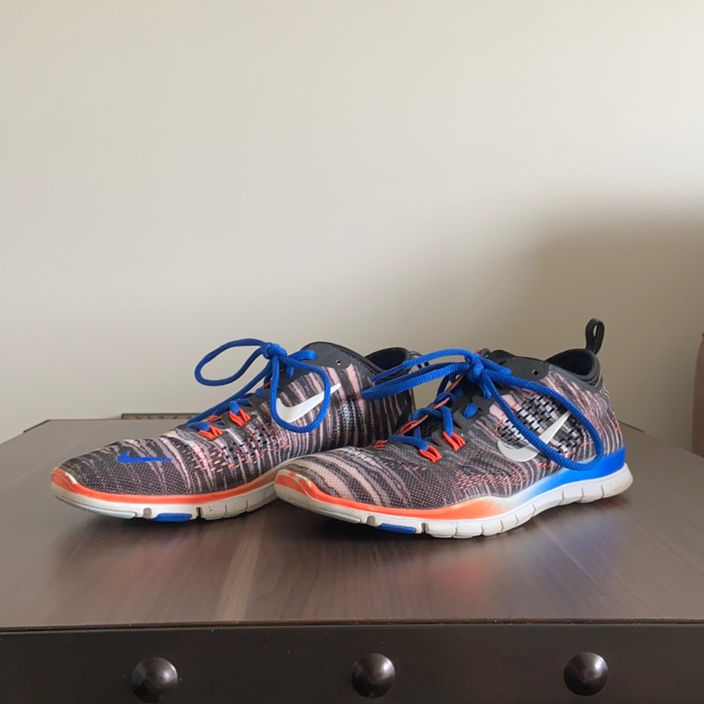 Blue and Orange Nike Multicolored Athletic Shoes.